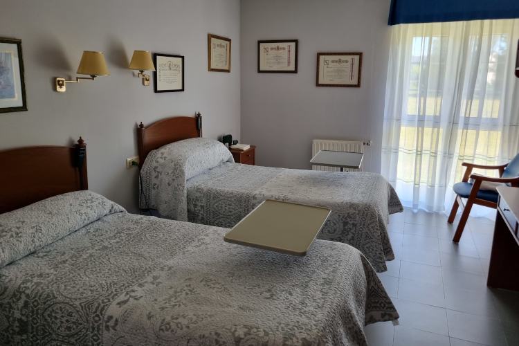 Habitación con dos camas